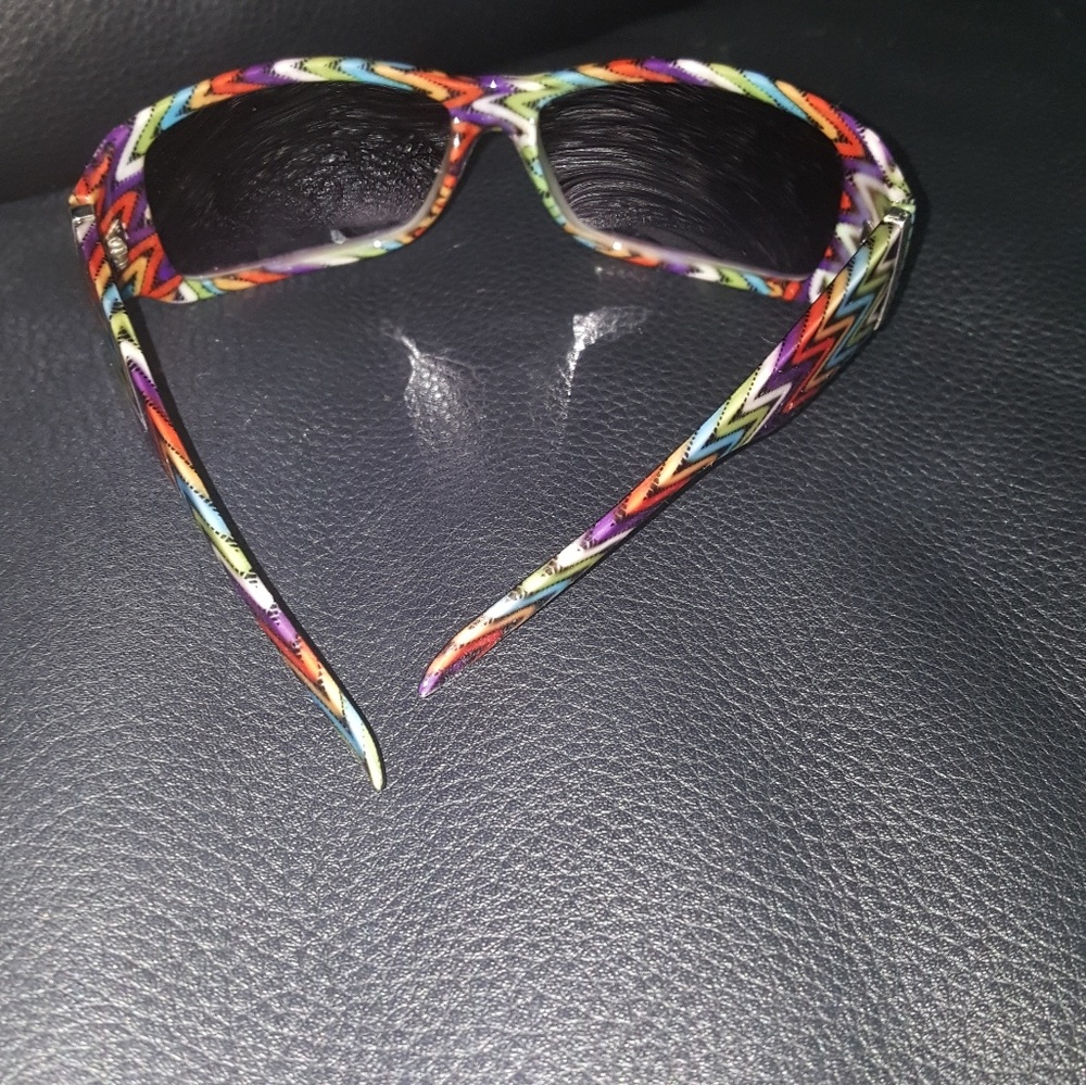 Sunglasses.  Assorted. Decorated ear pieces.